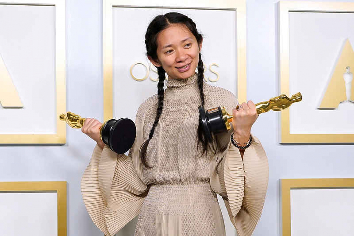 Winning director Zhao makes Oscars history, but honour censored in China